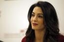 FILE - In this Jan. 25, 2016, file photo, British lawyer Amal Clooney attends a press conference with former Maldives president Mohamed Nasheed in London. Clooney is pushing for the United Nations to investigate and prosecute Islamic State commanders for genocide. Clooney wants IS leaders tried over the killings. The British lawyer appeared on NBC's 