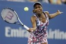 Williams of the U.S. hits a return to Kerber of Germany during their match at the U.S. Open women's singles tennis tournament in New York