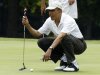 President Obama lines up a putt on first green at Andrews Air Force Basi in Maryland