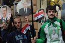 A rally outside the US embassy in Moscow on October 19, 2012 in support of the Syrian regime