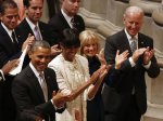 U.S. President Obama, first lady Michelle, Jill Biden and Vice President Biden applaud choir as they attend National Prayer Service in Washington