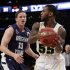 Brigham Young's Brock Zylstra (13) defends Baylor's Pierre Jackson (55) during the first half of an NIT semifinal basketball game Tuesday, April 2, 2013, in New York. (AP Photo/Frank Franklin)
