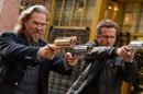 This film publicity image released by Universal Pictures shows Jeff Bridges, left, and Ryan Reynolds in a scene from "R.I.P.D." The film will be released nationwide on Friday, July 19. (AP Photo/Universal Pictures, Scott Garfield)