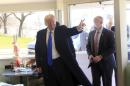 U.S. Republican presidential candidate Donald Trump greets guests as he stops in for breakfast at Miss Katie's Diner, while campaigning in Wisconsin,