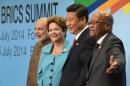 Indian Prime Minister Narendra Modi (L), Brazilian President Dilma Rousseff (2-L), Chinese President Xi Jinping (2nd-R) and South African President Jacob Zuma pose for the photo in Fortaleza, on July 15, 2014