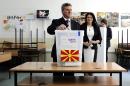 George Ivanov, presidential candidate of the ruling centre-right VMRO DPMNE party, casts his ballot in a polling station in Skopje on April 13, 2014, in the first round of the presidential election