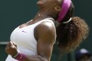 Serena Williams of the United States reacts to a point against Zheng Jie of China during a third round women's singles match at the All England Lawn Tennis Championships at Wimbledon, England, Saturday, June 30, 2012. (AP Photo/Anja Niedringhaus)