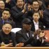 North Korean leader Kim Jong Un, left, and former NBA star Dennis Rodman watch North Korean and U.S. players in an exhibition basketball game at an arena in Pyongyang, North Korea, Thursday, Feb. 28, 2013. Rodman arrived in Pyongyang on Monday with three members of the Harlem Globetrotters basketball team to shoot an episode on North Korea for a new weekly HBO series. (AP Photo/VICE Media, Jason Mojica)