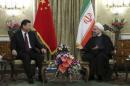 Iranian President Hassan Rouhani meets Chinese President Xi Jinping in Tehran