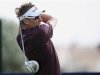 Poulter of England watches his shot from the 10th tee during the third round of the DP World Tour Championship at Jumeirah Golf Estates in Dubai