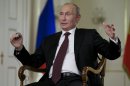 AP Interview: Putin warns West on Syria action