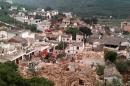 A general view shows collapsed houses after an earthquake hit Ludian county