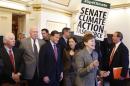 U.S. Senators from the Senate Climate Action Task Force gather on Capitol Hill in Washington