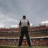 Referee takes his position on sideline during an NFL preseason football game between the Indianapolis Colts and Washington Redskins in Landover, Maryland