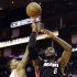 Miami Heat's LeBron James (6) shoots while guarded by Houston Rockets' Marcus Morris (2) in the first half of an NBA basketball game, Monday, Nov. 12, 2012, in Houston. (AP Photo/Pat Sullivan)