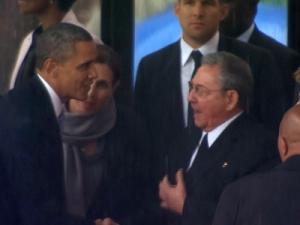 Raw: Obama and Castro Shake Hands at Service