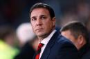 Cardiff City's Scottish manager Malky Mackay arrives for an English Premier League football match in Cardiff, south Wales on November 24, 2013