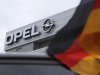 A German flag flatters in the wind in front of the Opel headquarters in Ruesselsheim