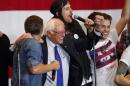 Democratic presidential candidate Sen. Bernie Sanders, I-Vt., pumps his fist during a campaign event, Monday, April 4, 2016, in Milwaukee. (AP Photo/Paul Sancya)
