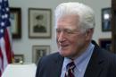 U.S. Representative Moran talks to a television reporter during interviews in his office on Capitol Hill in Washington