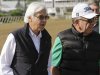 Trainer Bob Baffert, left and Bernie Schiappa walk off the track after watching Bodemeister in a morning workout at Pimlico Race Course, Thursday, May 17, 2012, in Baltimore. Bodemeister is entered in Saturday's Preakness Stakes at Pimlico. (AP Photo/Garry Jones)