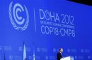 U.N. Secretary-General Ban talks during opening ceremony of plenary session of 18th session of COP18 in Doha