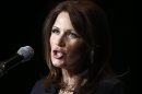 In this photo taken July 23, 2013, Rep. Michele Bachmann, R-Minn. speaks in Washington. The House Ethics Committee is launching a full-tilt investigation of Bachmann. The committee announced on Friday, July 26, 2013, it had received a referral from the Office of Congressional Ethics, an independent investigative body, and said in a brief statement that it would formally investigate the one-time Republican presidential candidate. (AP Photo/Charles Dharapak)
