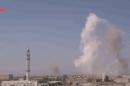 An image grab taken from a video released by Talbisseh Youtube Channel on October 15, 2015 shows smoke billowing over the small town of Talbisseh near the Syrian city of Homs following airstrikes