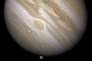 Handout of the planet Jupiter with one of its moons, Ganymede