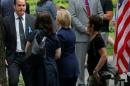 Clinton departs 9/11 ceremony after falling ill, campaign confirms she was diagnosed with pneumonia
