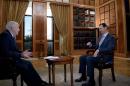 A picture dated February 8, 2015, and released by the Syrian Arab News Agency on February 10, 2015 shows President Bashar al-Assad (R) giving an interview to the BBC's Jeremy Bowen in Damascus