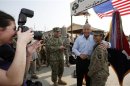 U.S. Secretary of Defense Chuck Hagel poses for a picture with a member of the U.S. 101st Airborne Division during his visit to Jalalabad Airfield in eastern Afghanistan