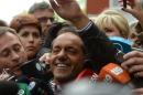Buenos Aires Governor and presidential candidate for the ruling "Frente para la Victoria" party Daniel Scioli waves after voting in Tigre, Buenos Aires on October 25, 2015