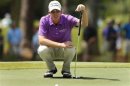 Castro of the U.S. lines up his putt on the seventh hole during the first round of The Players Championship at Ponte Vedra