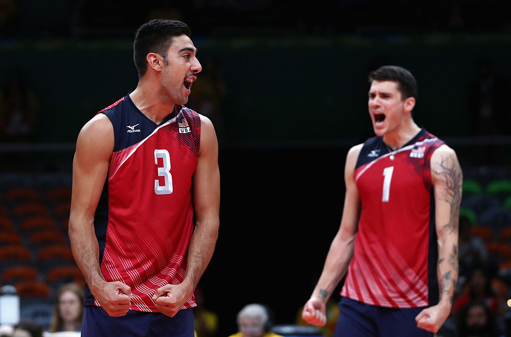 Taylor Sander and Matt Anderson of the U.S. celebrate during the bronze medal match. (Getty)