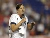 United States' Abby Wambach talks to spectators after an international friendly soccer match at Red Bull Arena, Thursday, June 20, 2013, in Harrison, N.J. The U.S. won 5-0. Wambach scored four goals in the first half to break Mia Hamm's record for international career goals. (AP Photo/Julio Cortez)