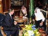 In this photo releases by the Saudi Press Agency, British Prime Minister David Cameron, left, meets with Saudi Arabia's King Abdullah, right, in Jiddah, Saudi Arabia, Tuesday, Nov. 6, 2012. British Prime Minister David Cameron suggested Tuesday that Syria's president Bashar Assad could be allowed safe passage out of the country if that option would guarantee an end to the nation's civil war. (AP Photo/Saudi Press Agency)