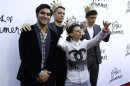 Director of the movie Vogt-Roberts poses with cast members Basso, Arias and Robinson at the premiere of "The Kings of Summer" at the Arclight theatre in Hollywood