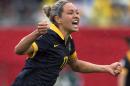 Australia's Kyah Simon celebrates after scoring against Brazil during second-half FIFA Women's World Cup soccer game action in Moncton, New Brunswick, Canada, Sunday, June 21, 2015. (Andrew Vaughan/The Canadian Press via AP) MANDATORY CREDIT