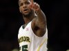 Baylor's Pierre Jackson (55) points to the crowd during the second half of an NIT semifinal basketball game against Brigham Young Tuesday, April 2, 2013, in New York. (AP Photo/Frank Franklin)