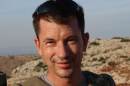 A handout photo taken in October 2012 and obtained courtesy of the Cantlie family shows British photojournalist John Cantlie at an undisclosed location in Syria