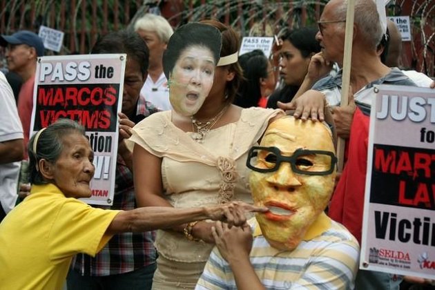 Protesters join victims of Martial Law during a protest rally at the historic Mendiola Bridge in Manila, on 20 September 2012, to commemorate the 40th anniversary of the declaration of Martial Law. (Jhun Dantes Jr/NPPA Images)