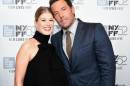 Actors Rosamund Pike and Ben Affleck, who star in "Gone Girl," attend the Opening Night Gala Presentation and World Premiere of the film on September 26, 2014, in New York