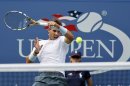 Nadal of Spain hits a return to Dodig of Croatia at the U.S. Open tennis championships in New York