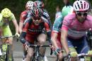 Michael Matthews, right, leads Cadel Evans as he pedals on his way to win the sixth stage of the Giro d'Italia, Tour of Italy cycling race, from Sassano to Montecassino, Italy, Thursday May 15, 2014. Overall leader Michael Matthews claimed his first individual victory on the sixth stage of the Giro d'Italia Thursday but the day was marred by a crash which left Giampaolo Caruso seriously injured. (AP Photo/Fabio Ferrari)