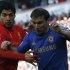 Chelsea's Ivanovic challenges Liverpool's Suarez during their English Premier League soccer match in Liverpool