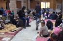 A still image taken from a video obtained by Reuters, said to be shot on January 4, 2017, shows civilians, who were evacuated from Wadi Barada, sitting inside a shelter in the Damascus suburb of Rawda