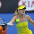 Hantuchova of Slovakia hits a return to Sharapova of Russia during an exhibition match at the Australian Open tennis tournament in Melbourne