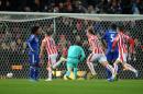 Stoke's Jonathan Walters, second right, celebrates after scoring during the English League Cup Fourth Round soccer match between Stoke City and Chelsea at the Britannia Stadium, Stoke on Trent, England, Tuesday, Oct. 27, 2015. (AP Photo/Rui Vieira)