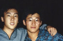 FILE - This 1988 file photo provided by Bobby Lee shows Kenneth Bae, right, and Lee together when they were freshmen students at the University of Oregon. Bae, detained for nearly six months in North Korea, has been sentenced to 15 years of "compulsory labor" for unspecified crimes against the state, Pyongyang announced Thursday, May 2, 2013. (AP Photo/The Register-Guard, Bobby Lee, File)